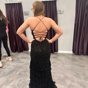 Size 4 Primavera prom dress wore once. Extra sequins in a bag.